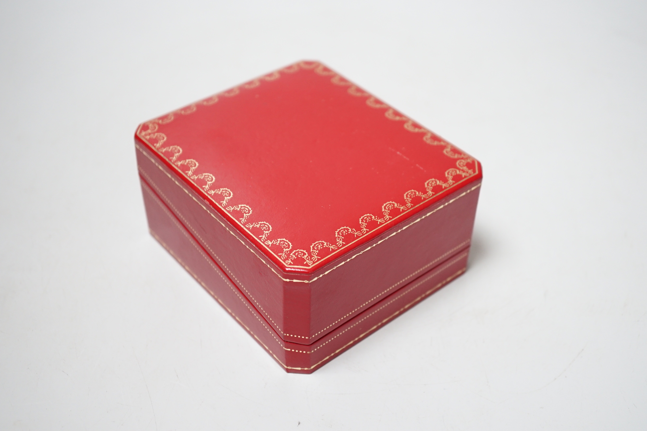 A Cartier travel timepiece, 9cm high, cased